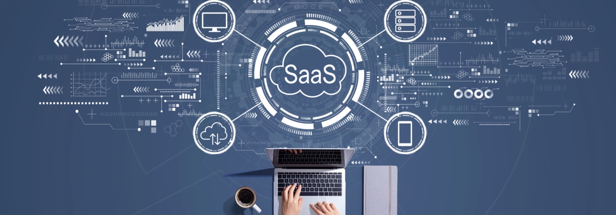 SaaS - software as a service concept with person working with laptop